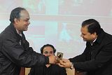 15. Sundeep C Srivastav  felicitating Dr Narendra Tripathi, Head, Electronic Media, KTUJ&M